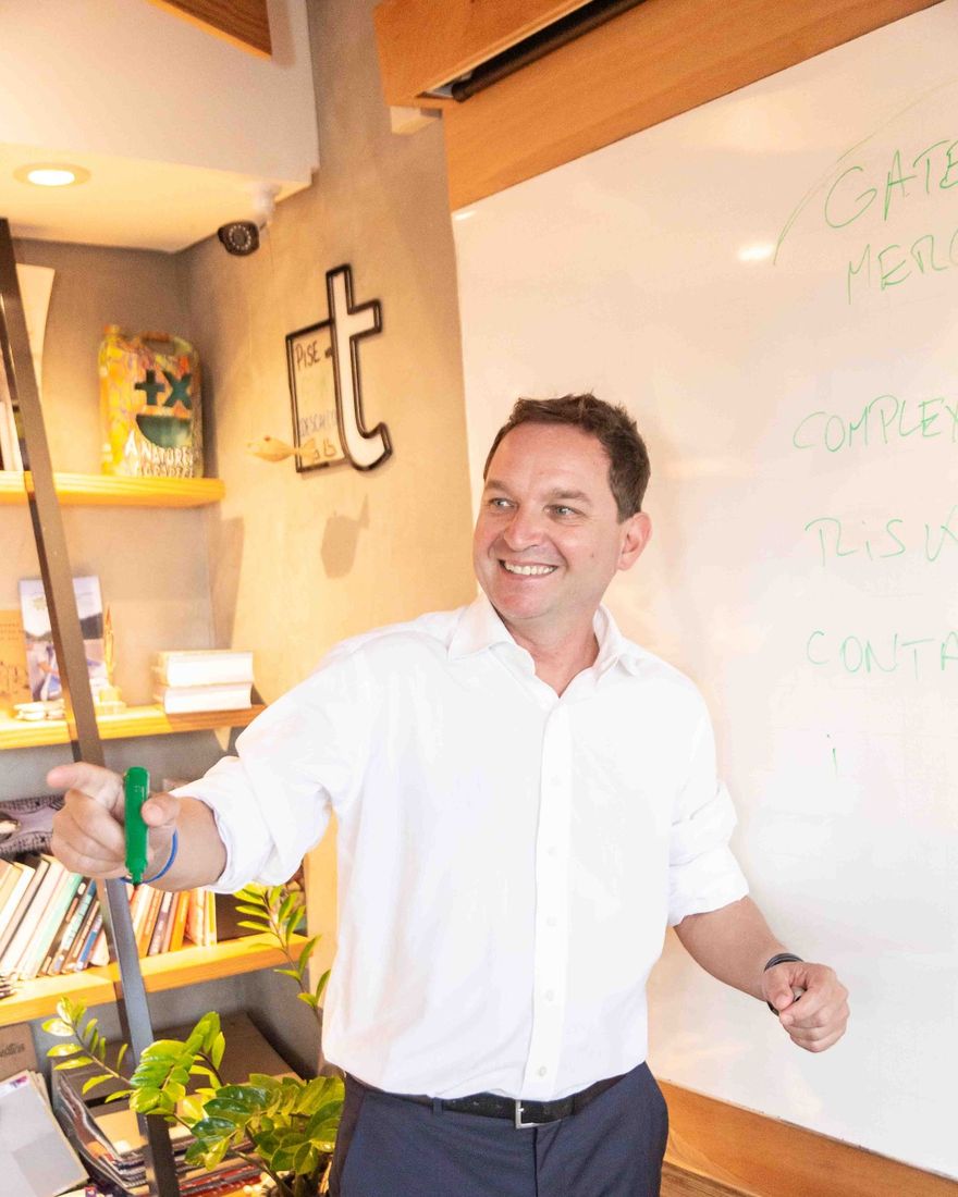 Hugo Hagel at a whiteboard mapping out a market entry plan